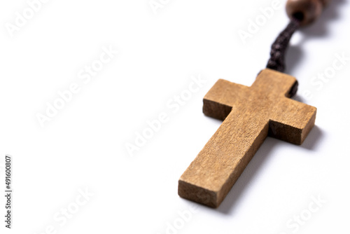 Rosary catholic cross isolated on white background. Copy space photo