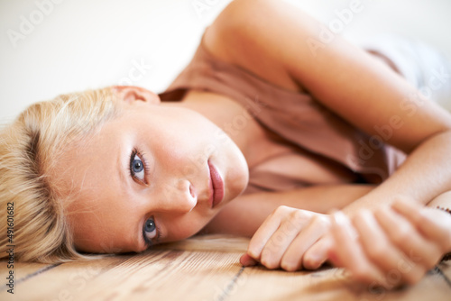 Beautiful and homely. Shot of a gorgeous young woman relaxing at home.