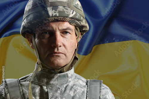 Mature male soldier against...
