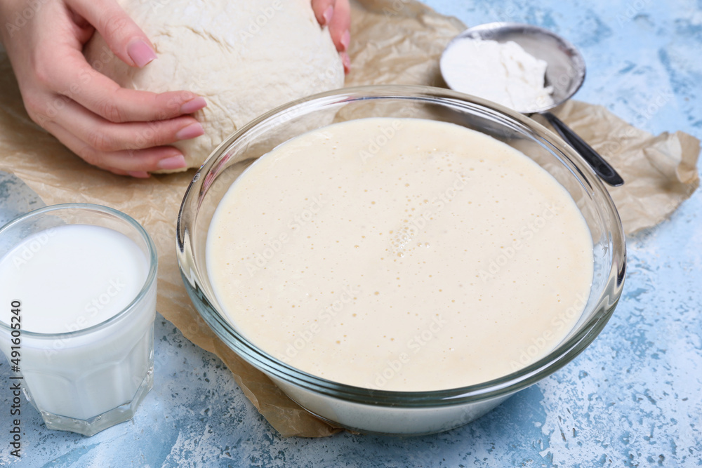Raw batter in bowl on color background Raw batter in bowl on color background