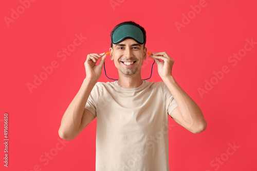 Smiling young man with slee...