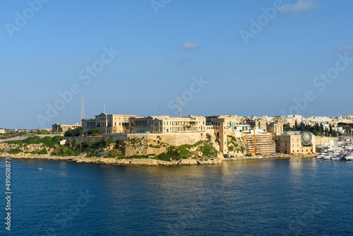Overlooking the Grand Harbour from Kalkara, Malta is Villa Bighi which was a British Royal Naval Hospital Bighi from 1830 to 1970. On the right is the cot lift that was used to bring up patients from 