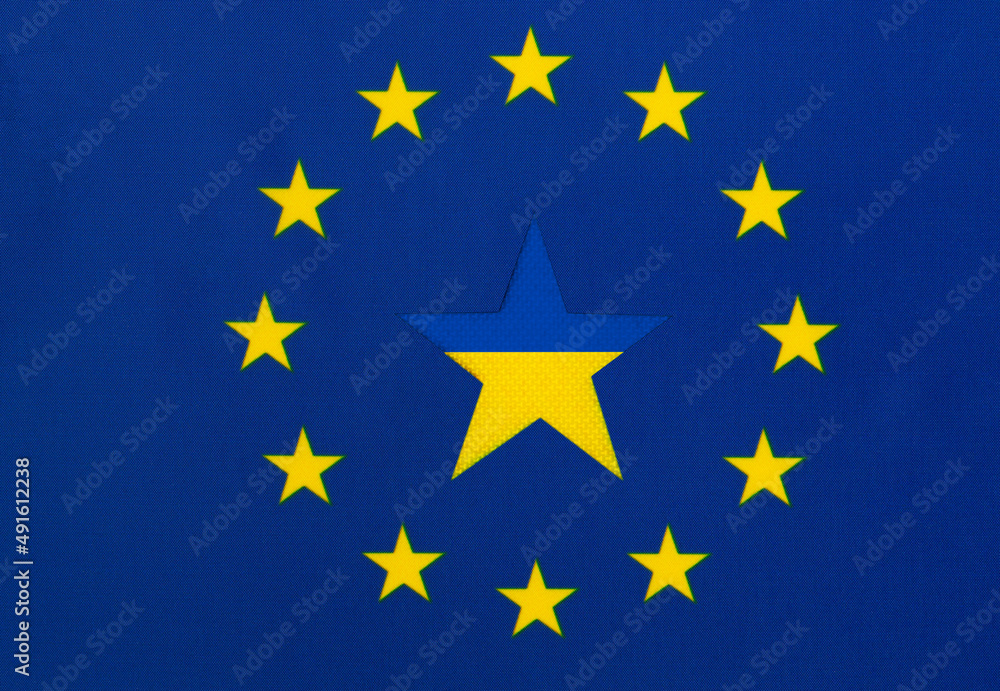 Yellow-blue star in the center of the European flag. Concept of Ukraine's entry into the European Union (EU). Yellow-blue star in the center of the European flag. Concept of Ukraine's entry into the European Union (EU).