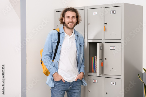 Handsome male student near ...