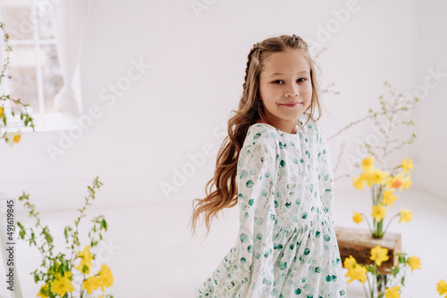 Girl Child Resting in House Room Decorate Flowers
