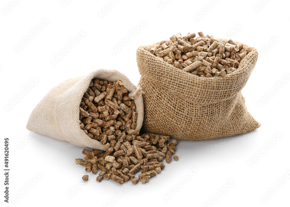 Sacks with wood pellets on white background Sacks with wood pellets on white background
