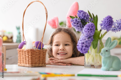 Cute little girl with bunny...