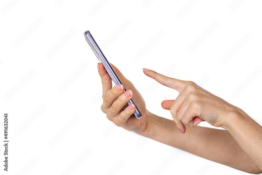 Hand holding and using smartphone isolated on white background. Side view. Hand holding and using smartphone isolated on white background. Side view.