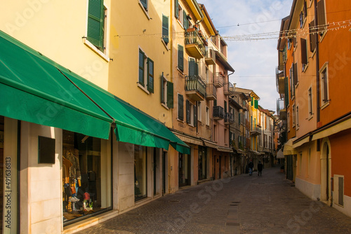 Fototapeta Naklejka Na Ścianę i Meble -  A shopping street at Christmas in Garda town on the east shore of lake Garda, Verona Province, Veneto, north east Italy
