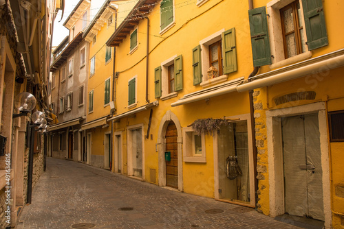 A quiet back street at Christmas in Garda town on the east shore of lake Garda, Verona Province, Veneto, north east Italy 