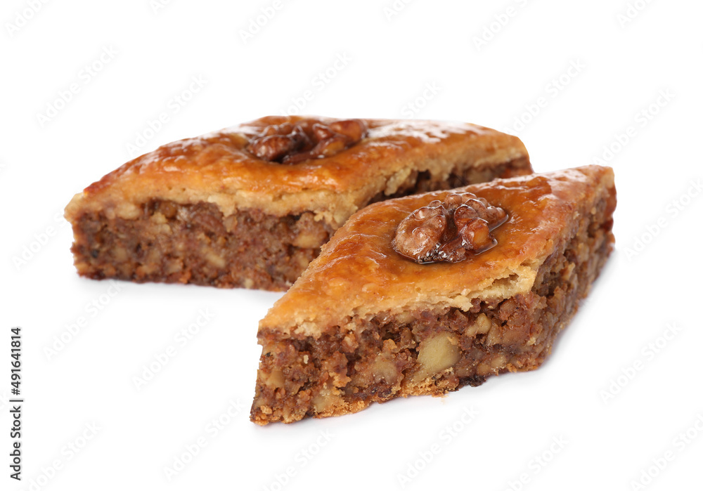 Delicious honey baklava with walnuts on white background Delicious honey baklava with walnuts on white background