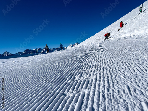 a close up of freshly groomed snow slope