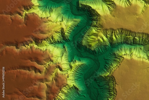 Digital elevation model of a deep stone canyon. A meandering and curving river below. GIS 3D product made after proccesing aerial data. © Ungrim