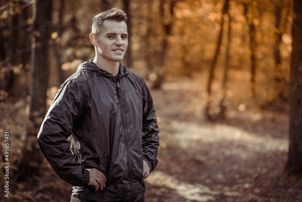 Portrait of active cheerful man in the forest Portrait of active cheerful man in the forest