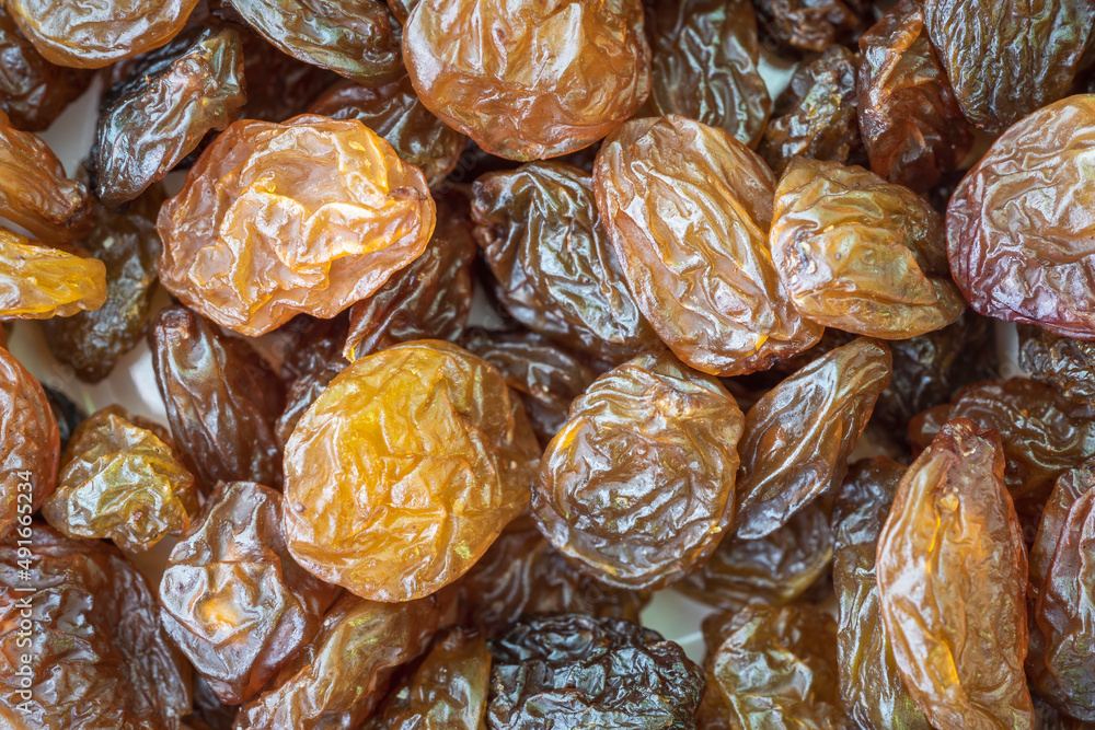 Macro close up of raisins placed on a packing pile Macro close up of raisins placed on a packing pile