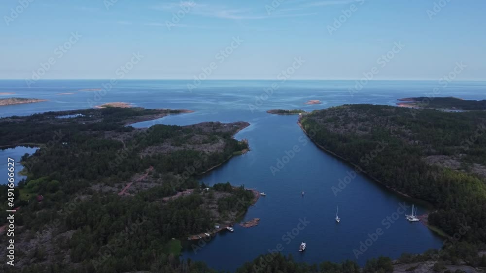 Aerial view of Djupviken Bay in Geta, Aland Islands, Finland, orbiting shot Aerial view of Djupviken Bay in Geta, Aland Islands, Finland, orbiting shot