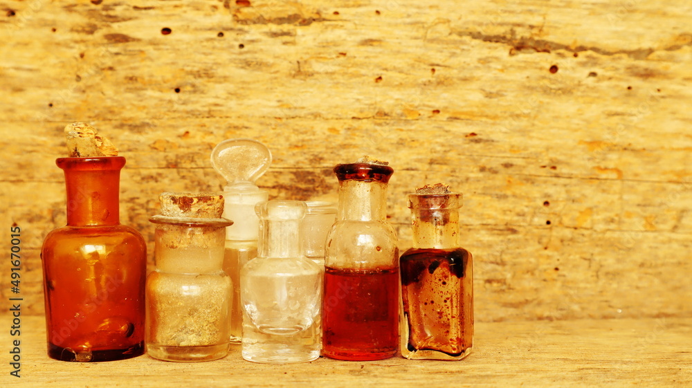 Antique Medicine Bottles, Victorian Era, on a original 1800s wooden background with space for your text or design