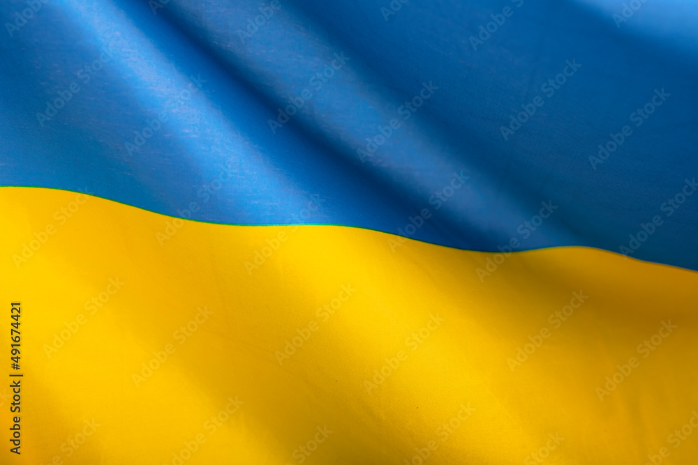 National flag of Ukraine fabric textile background National flag of Ukraine fabric textile background