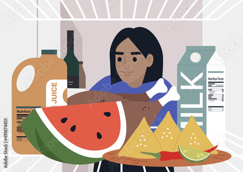 A young female Caucasian character looking into a fridge, lunch at home, a lockdown lifestyle