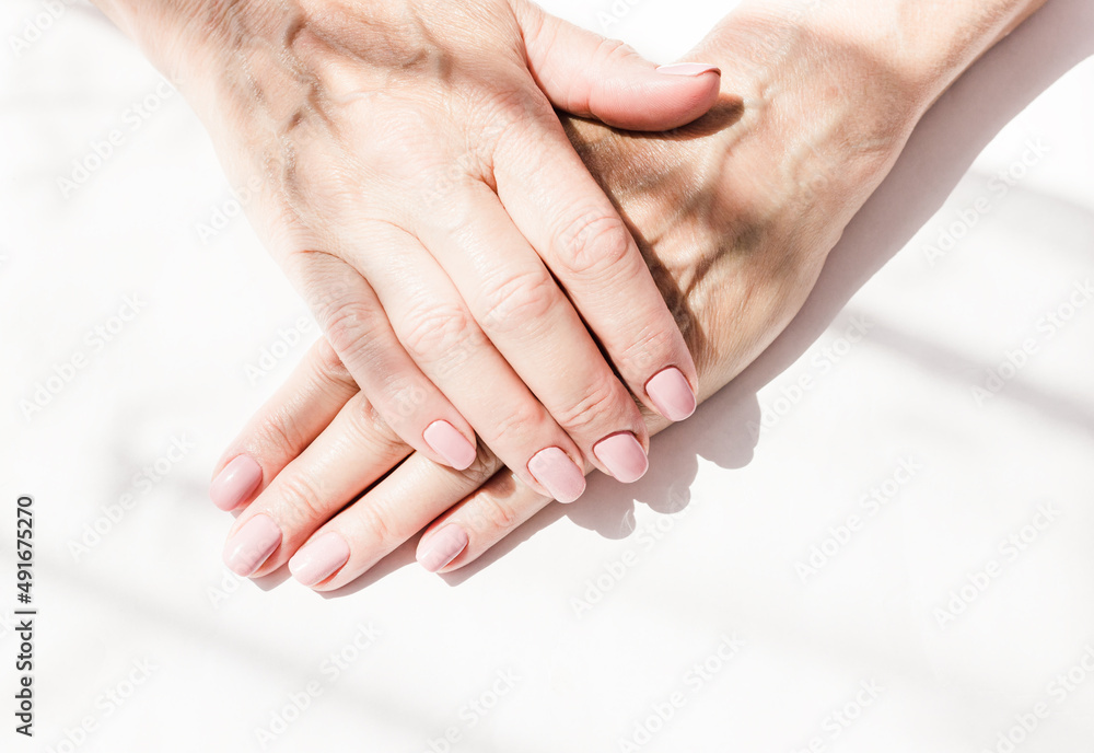 Beautiful, natural, pastel manicure by an old woman, senora. Beautiful, natural, pastel manicure by an old woman, senora.