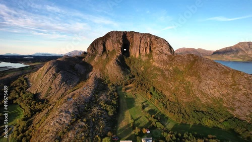 Torghatten mountain at sunset in scenic Norwegian Landscape