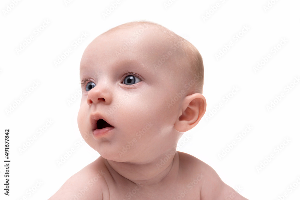 close-up portrait of a surprised breastfed baby on a white isolated background close-up portrait of a surprised breastfed baby on a white isolated background