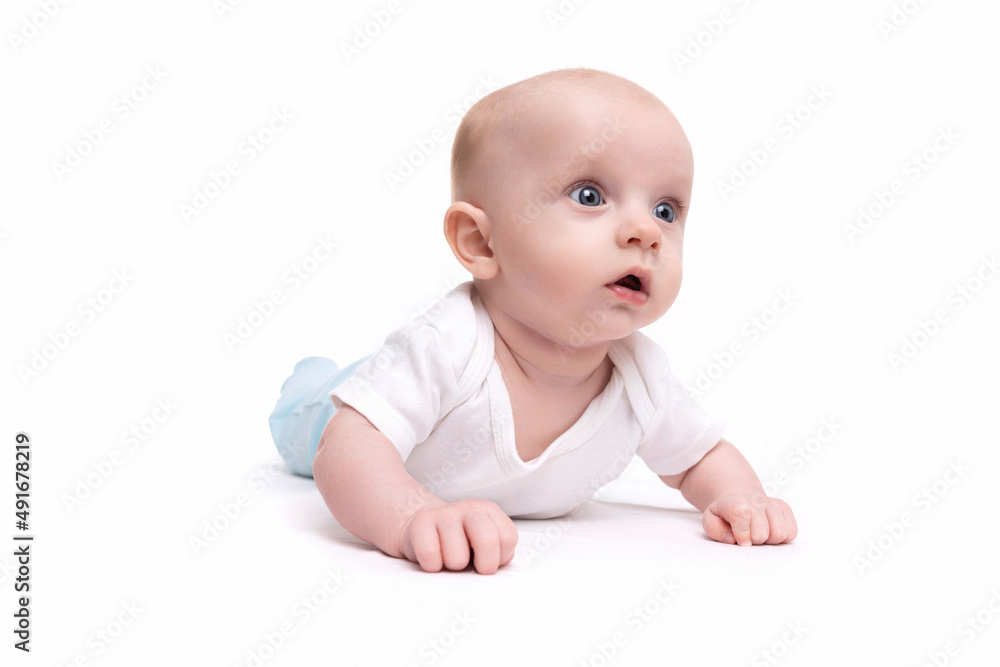 surprised baby with wide open eyes and mouth on a white isolated background looks to the side surprised baby with wide open eyes and mouth on a white isolated background looks to the side
