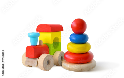 Colorful wooden toys isolated on white background photo