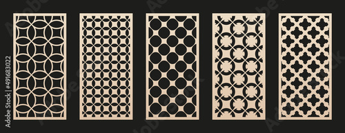 Laser cut patterns. Vector set of oriental geometric ornaments with grid, mesh, circles, flower silhouettes. Elegant template for cnc cutting, decorative panels of wood, paper, metal. Aspect ratio 1:2 photo