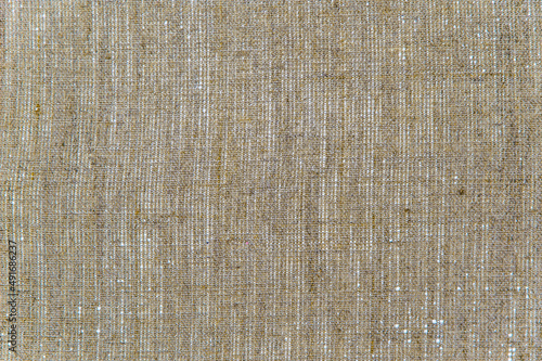 simple linen background: the reverse side of the primed canvas stretched over the frame, close, toning