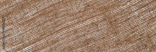 simple linen background: the reverse side of the primed canvas stretched over the frame, close, toning