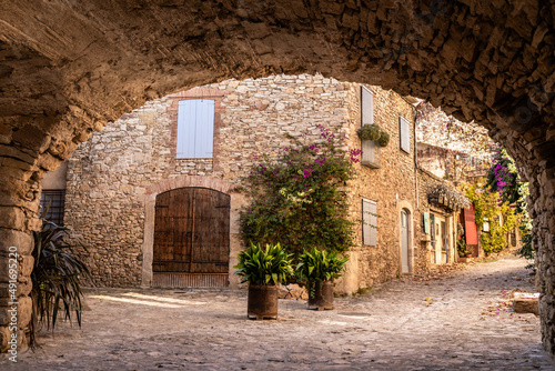 Old building with plants on street photo