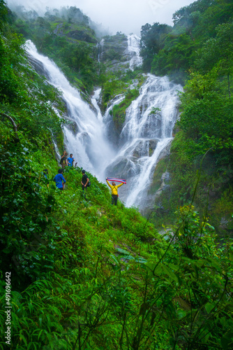 Tak  Thailand - July 28  2018  Tourists are watching Heart-shaped waterfall. Pitugro waterfall locate in deep forest