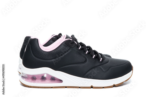Black sneakers on an isolated background.