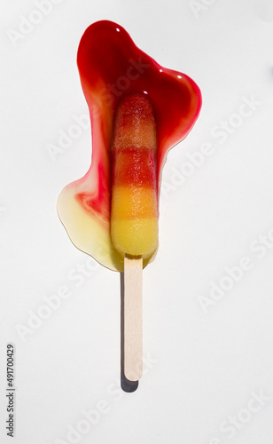 An iced popsicle lolly melting in the summer sun