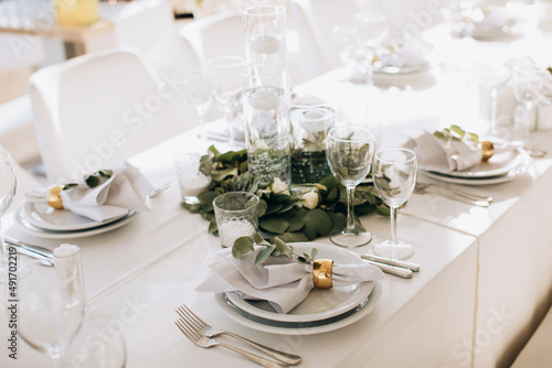White festive table wedding setting in restaurant