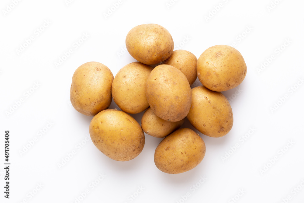 Potatoes isolated on white background. Flat lay. Top view. Potatoes isolated on white background. Flat lay. Top view.