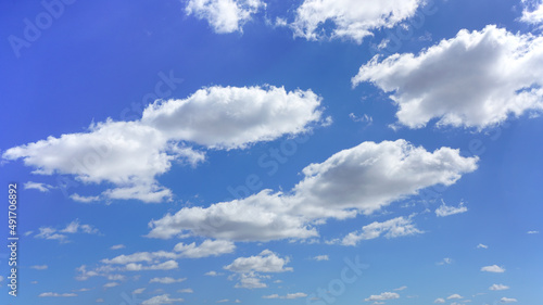 Cumulus clouds and blue sky suitable for background or sky replacement.