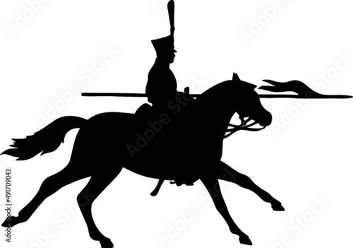 Silhouette of a horseman with a saber. The military cavalry is attacking. Soldier of the Napoleonic War	