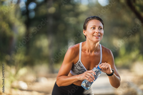 Photography Woman Runner Taking A Break While Jogging In Park At Summer Day