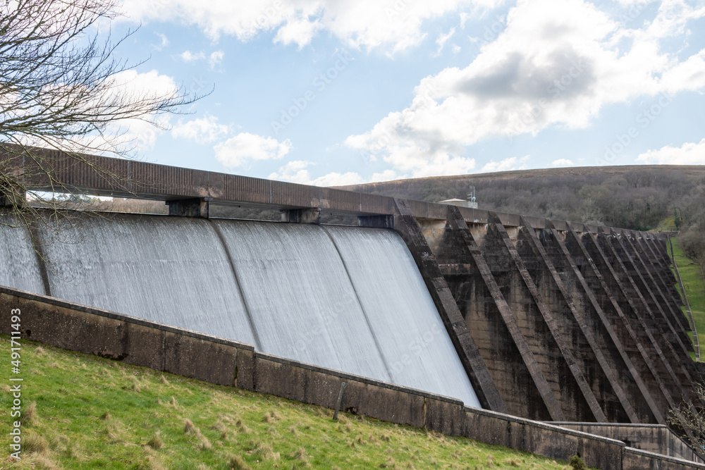 Long exposure of the waterfall flowing over Wimbleball dam at Wimbleball lake in Somerset Long exposure of the waterfall flowing over Wimbleball dam at Wimbleball lake in Somerset