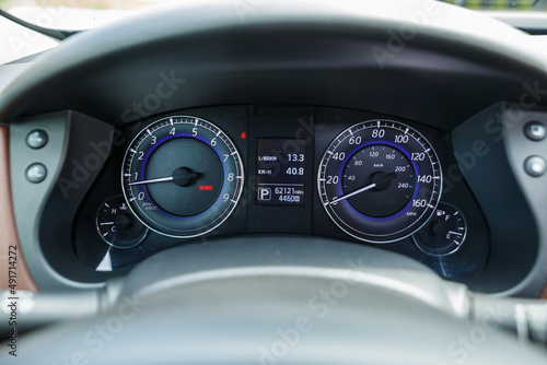 Canvas Print Digital panel of a modern car, speedometer in the interior of a new car