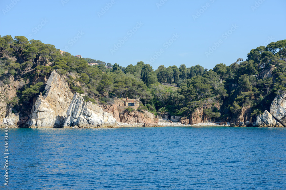 Small cave with beach Agulla near Saint Christina, Catalonia.