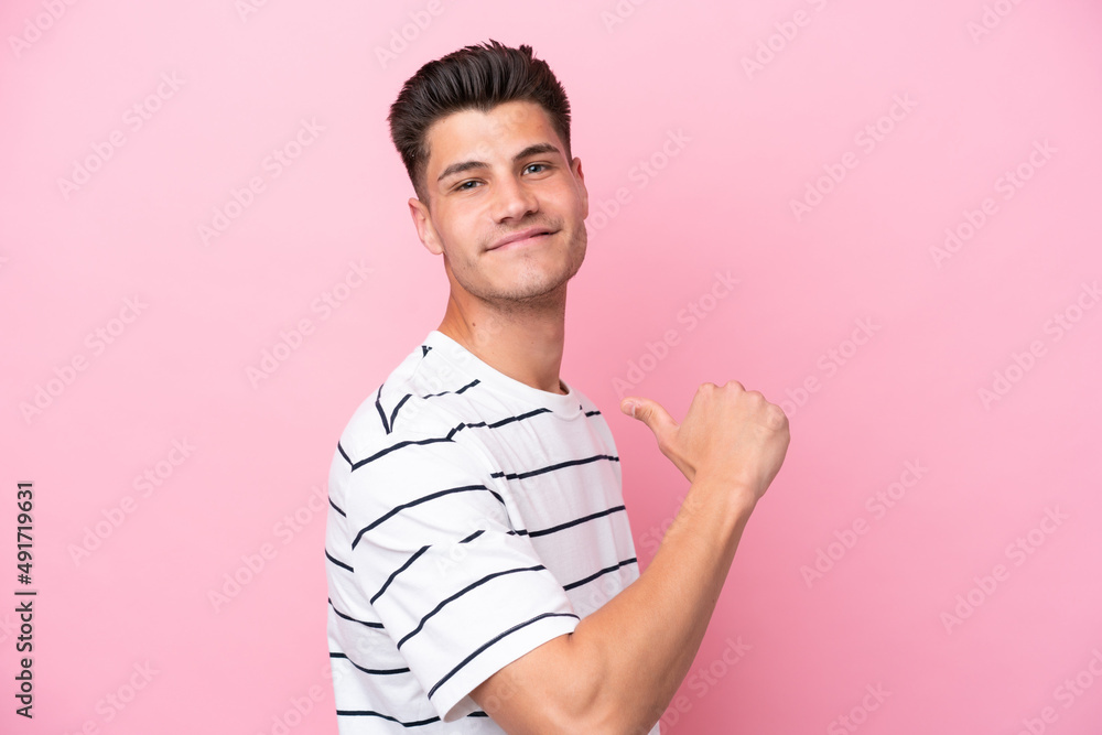 Young caucasian man isolated on pink background proud and self-satisfied Young caucasian man isolated on pink background proud and self-satisfied
