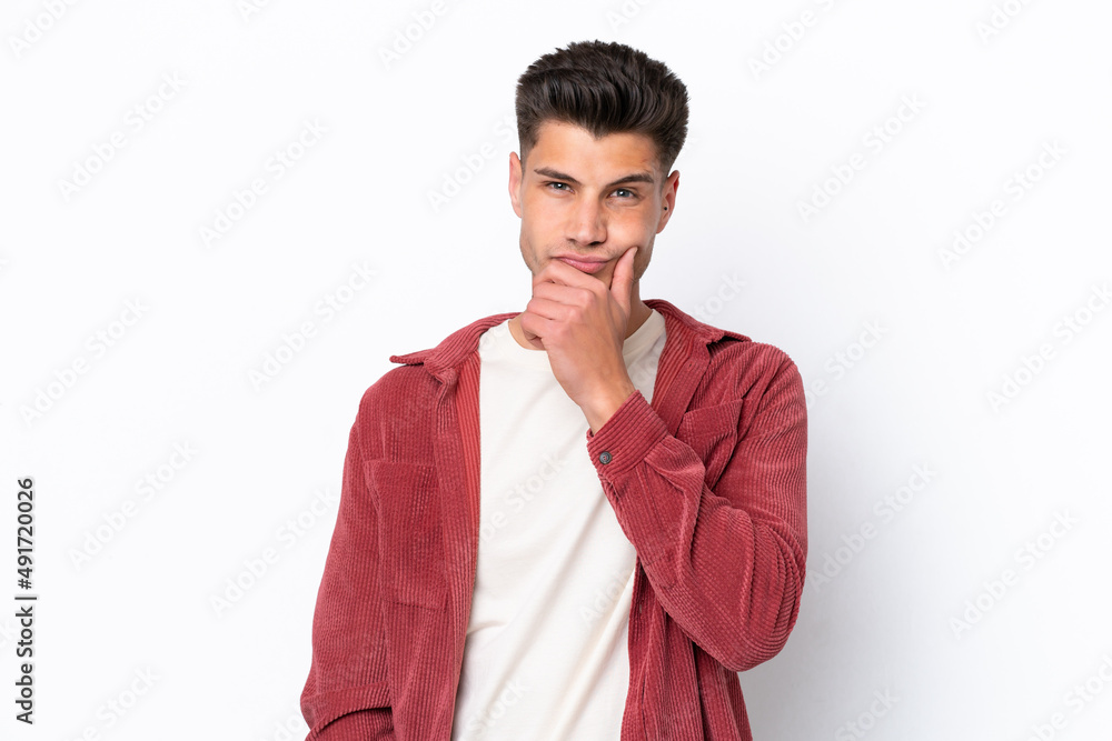 Young caucasian man isolated on white background having doubts Young caucasian man isolated on white background having doubts