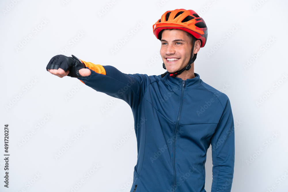 Young cyclist caucasian man isolated on white background giving a thumbs up gesture Young cyclist caucasian man isolated on white background giving a thumbs up gesture