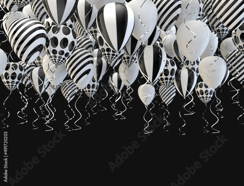 Fondo festivo y de celebración. Elegantes globos blancos y negros de helio volando sobre fondo negro para anuncios, cumpleaños e invitaciones. photo