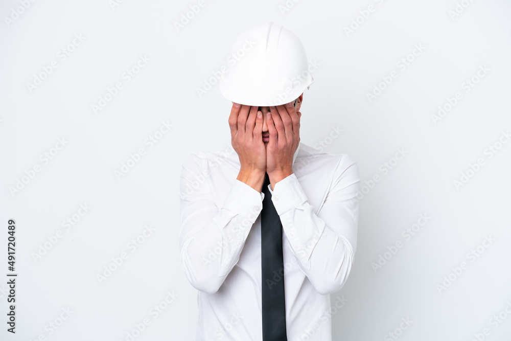 Young architect caucasian man with helmet and holding blueprints isolated on white background with tired and sick expression Young architect caucasian man with helmet and holding blueprints isolated on white background with tired and sick expression