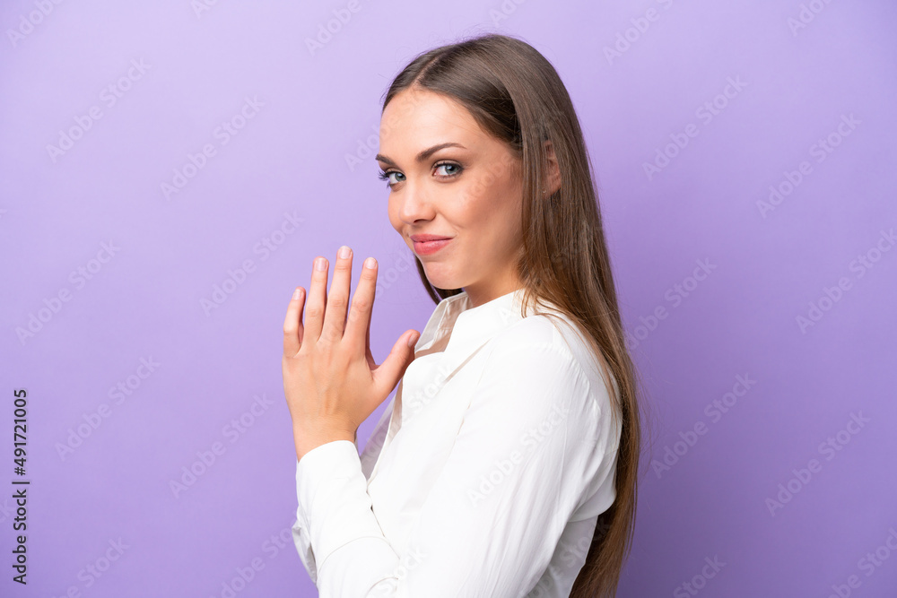 Young caucasian woman isolated on purple background scheming something Young caucasian woman isolated on purple background scheming something