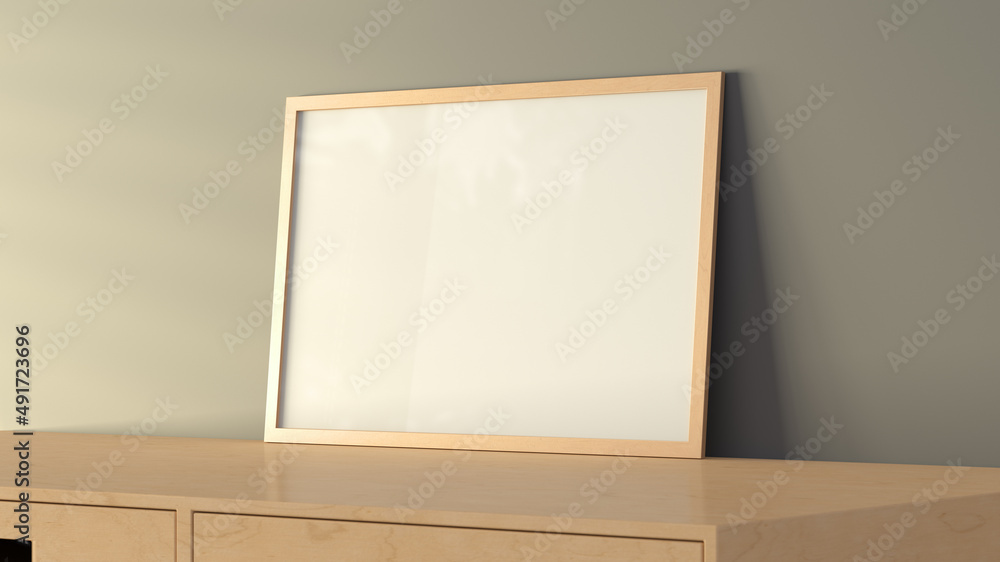 Horizontal frame poster mock up on the wooden table with gray wall on background. Horizontal frame poster mock up on the wooden table with gray wall on background.